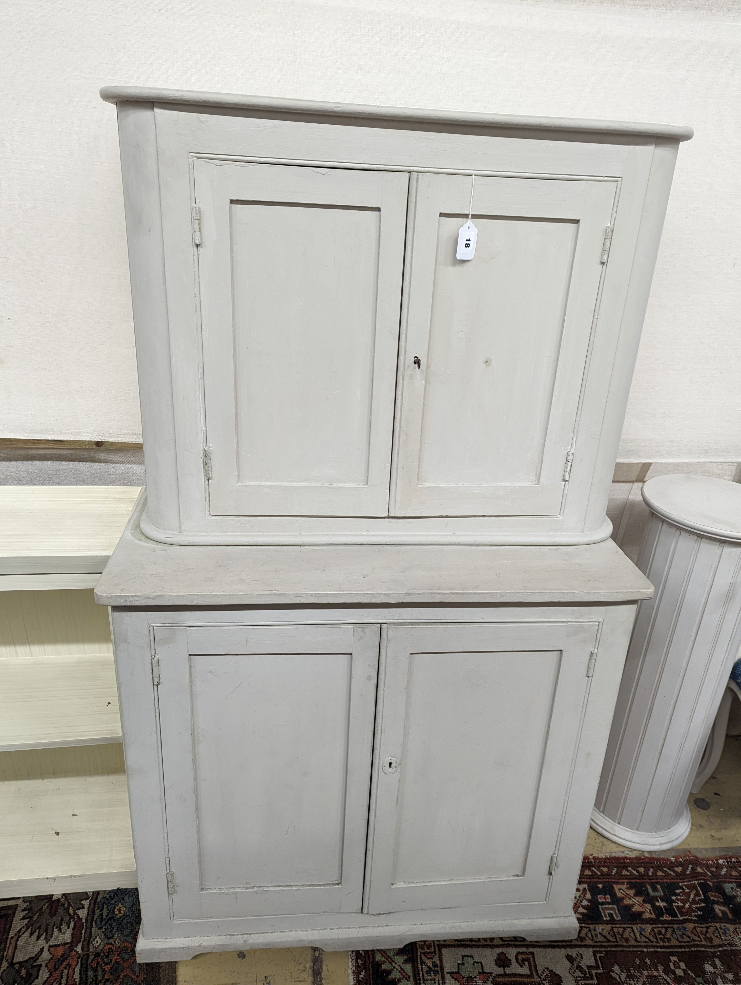 A white painted two section kitchen cupboard of small proportions, width 91cm, depth 47cm, height 154cm